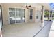 Spacious covered patio, adjacent to the pool and offering ample outdoor space at 9029 Laurel Ridge Dr, Mount Dora, FL 32757