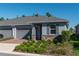 House exterior with gray siding and two-car garage at 5237 Nw 34Th St, Ocala, FL 34482