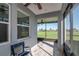 Bright screened porch with golf course view at 5237 Nw 34Th St, Ocala, FL 34482