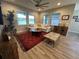 Living room boasts a sectional sofa, coffee table, and stylish rug at 5237 Nw 34Th St, Ocala, FL 34482