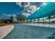 Resort-style pool with blue shade canopy at 5237 Nw 34Th St, Ocala, FL 34482