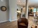 Open living room with kitchen view and comfortable seating at 5237 Nw 34Th St, Ocala, FL 34482