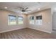 Spacious bonus room with wood-look tile flooring and large windows at 5237 Nw 34Th St, Ocala, FL 34482