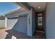 Front entry with dark brown door and brick pavers at 5237 Nw 34Th St, Ocala, FL 34482