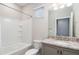 Clean bathroom with granite countertop, single vanity, and a tub shower combo at 5237 Nw 34Th St, Ocala, FL 34482