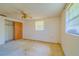 Empty bedroom with ceiling fan, closet and carpeted floor at 2429 Cr 451, Lake Panasoffkee, FL 33538