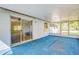Covered screened porch with sliding glass door at 2429 Cr 451, Lake Panasoffkee, FL 33538