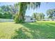 Side view of house with large tree at 2429 Cr 451, Lake Panasoffkee, FL 33538