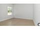 Empty bedroom with tile floor and window at 6839 Sw 149Th Lane Rd, Ocala, FL 34473