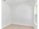 Simple bedroom with tile floors and a window at 6839 Sw 149Th Lane Rd, Ocala, FL 34473
