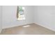 Bright bedroom with tile floors and a window at 6839 Sw 149Th Lane Rd, Ocala, FL 34473