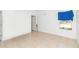 Empty bedroom with tile floors and a window overlooking the backyard at 6839 Sw 149Th Lane Rd, Ocala, FL 34473