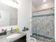 Bathroom with granite countertop and shower at 6839 Sw 149Th Lane Rd, Ocala, FL 34473