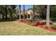 Attractive front yard with landscaping and a paved driveway at 5038 Se 6Th Ave, Ocala, FL 34480