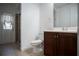 Clean bathroom with updated vanity and tiled floors at 5038 Se 6Th Ave, Ocala, FL 34480