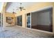 Spacious covered patio with access to the pool and interior at 5038 Se 6Th Ave, Ocala, FL 34480