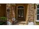 Elegant entryway with double doors and stone columns at 5038 Se 6Th Ave, Ocala, FL 34480