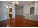 Formal dining room with hardwood floors and built-in cabinetry at 5038 Se 6Th Ave, Ocala, FL 34480