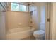 Bathroom with bathtub, shower, and toilet at 5038 Se 6Th Ave, Ocala, FL 34480