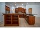 Kitchen features wood cabinetry, granite countertops, and stainless steel appliances at 5038 Se 6Th Ave, Ocala, FL 34480