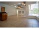 Living area with tile floors, high ceilings and pool access at 5038 Se 6Th Ave, Ocala, FL 34480