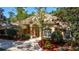 Beautiful home with stone accents and a landscaped yard at 5038 Se 6Th Ave, Ocala, FL 34480