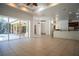 Open floor plan Gathering room with pool view and sliding glass doors at 5038 Se 6Th Ave, Ocala, FL 34480