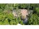 Aerial view of home with pool and spacious backyard at 5038 Se 6Th Ave, Ocala, FL 34480