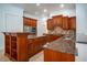 Island kitchen features stainless steel appliances and ample storage at 5038 Se 6Th Ave, Ocala, FL 34480