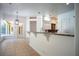 Kitchen with breakfast bar and granite countertops at 5038 Se 6Th Ave, Ocala, FL 34480