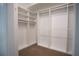 Large walk-in closet with ample shelving and hanging space at 5038 Se 6Th Ave, Ocala, FL 34480