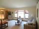 Living room with comfortable seating and plenty of natural light at 16789 Se 69Th Ln, Ocklawaha, FL 32179