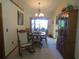 Dining room with wooden table and access to a patio at 16789 Se 69Th Ln, Ocklawaha, FL 32179