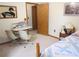 Bedroom with a double bed and small work area at 16789 Se 69Th Ln, Ocklawaha, FL 32179