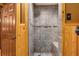 Clean bathroom with tiled shower and built-in seat at 11531 Se 60Th Ave, Belleview, FL 34420