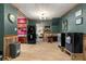 Small kitchen with red cabinets and laminate floors at 11531 Se 60Th Ave, Belleview, FL 34420