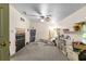 Bedroom with carpeting, ceiling fan and storage at 11531 Se 60Th Ave, Belleview, FL 34420