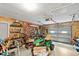 Attached garage with ample storage space for tools and equipment at 612 Fannich Ct, Leesburg, FL 34788