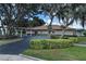 Community clubhouse nestled amongst mature trees at 612 Fannich Ct, Leesburg, FL 34788