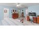 Main bedroom with plenty of space, hardwood floors, and built-in dresser at 612 Fannich Ct, Leesburg, FL 34788