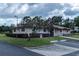 Community office building with landscaping and parking at 612 Fannich Ct, Leesburg, FL 34788