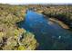 Kayakers enjoy the crystal-clear waters of Rainbow River at 8975 Sw 202Nd Avenue Rd, Dunnellon, FL 34431