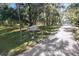 Image of community entrance with sign and landscaping at 8975 Sw 202Nd Avenue Rd, Dunnellon, FL 34431
