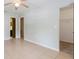 Spacious bedroom with tile floors and a walk-in closet at 8975 Sw 202Nd Avenue Rd, Dunnellon, FL 34431