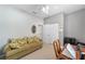 Versatile bedroom with a couch, workspace, and plenty of closet space at 8678 Sw 83Rd Cir, Ocala, FL 34481