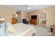 Spacious main bedroom with large windows and a view into the breakfast nook at 8678 Sw 83Rd Cir, Ocala, FL 34481