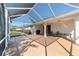 Expansive covered and screened patio with backyard views at 8678 Sw 83Rd Cir, Ocala, FL 34481