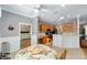 Open concept kitchen and breakfast nook with views into the main bedroom at 8678 Sw 83Rd Cir, Ocala, FL 34481