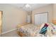 Spacious bedroom with light wood furniture and ample closet space at 8678 Sw 83Rd Cir, Ocala, FL 34481