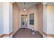 Covered entryway with decorative door and side window at 8678 Sw 83Rd Cir, Ocala, FL 34481